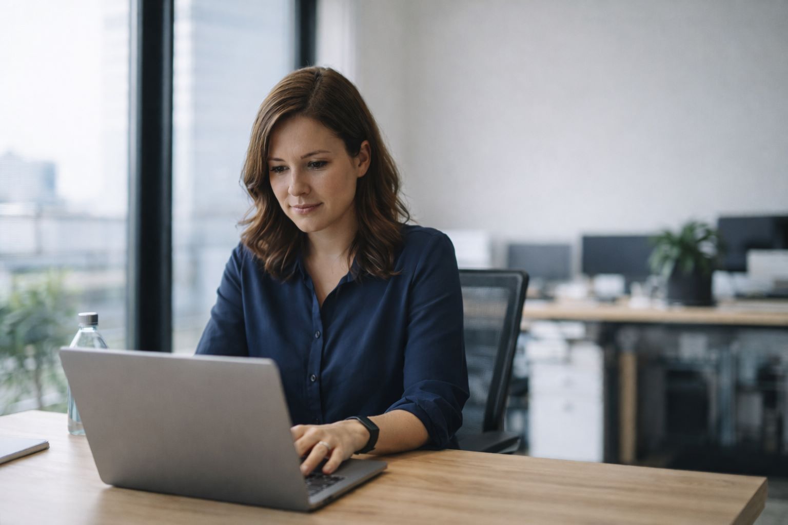 Professional woman working in office